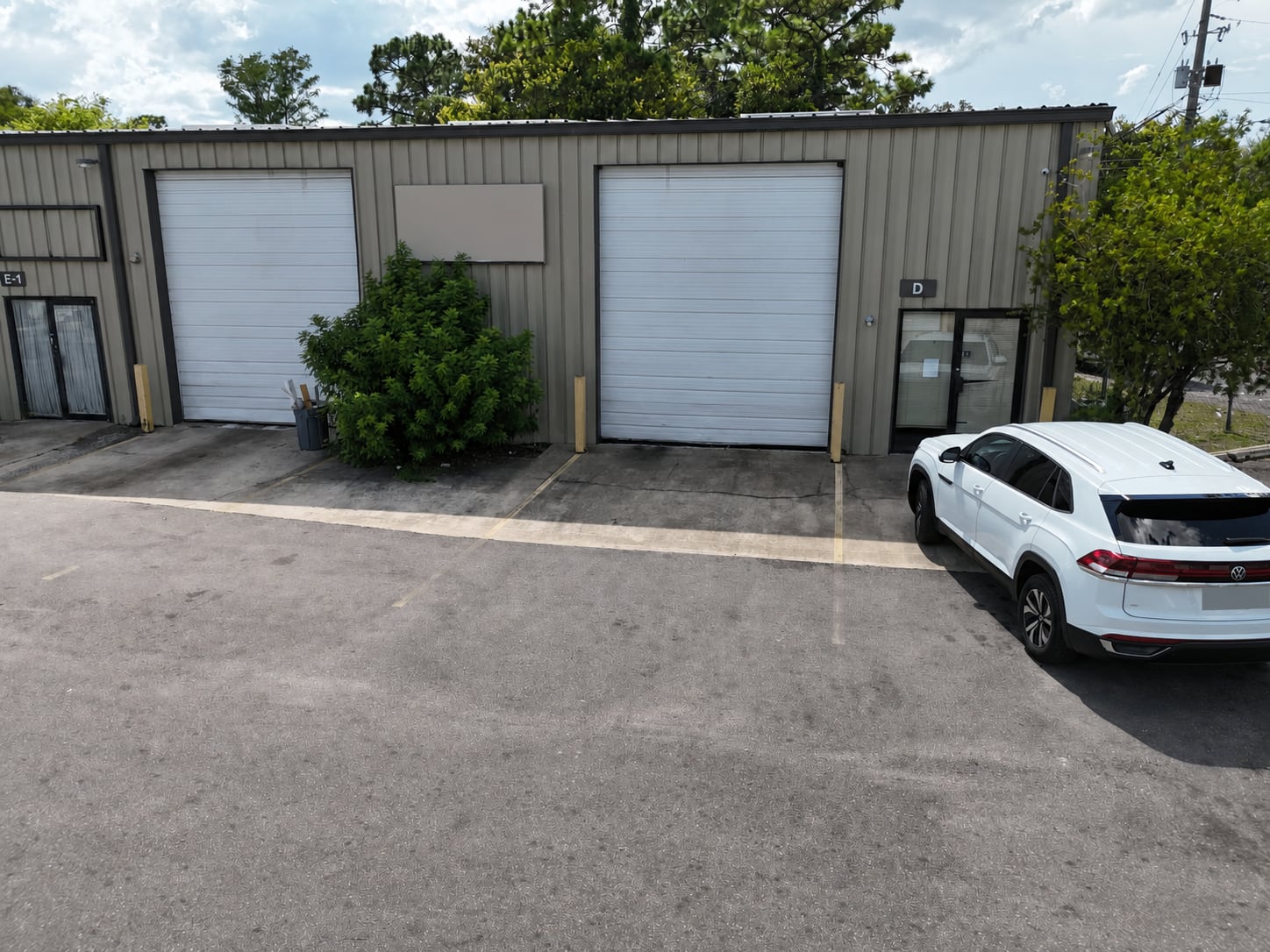 Suite D roll-up doors and entrance